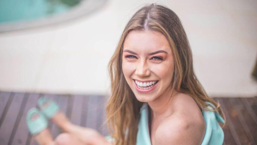 Lasting Smiles Dental Care Las Vegas Teeth Whitening Young Woman Showing Bright Teeth